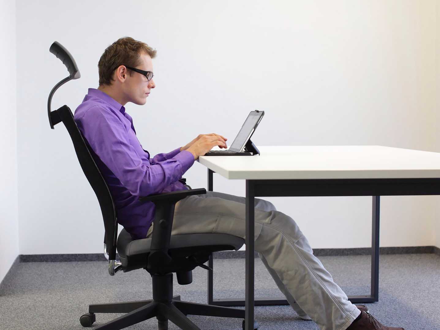 Person sitting in ergonomic chair